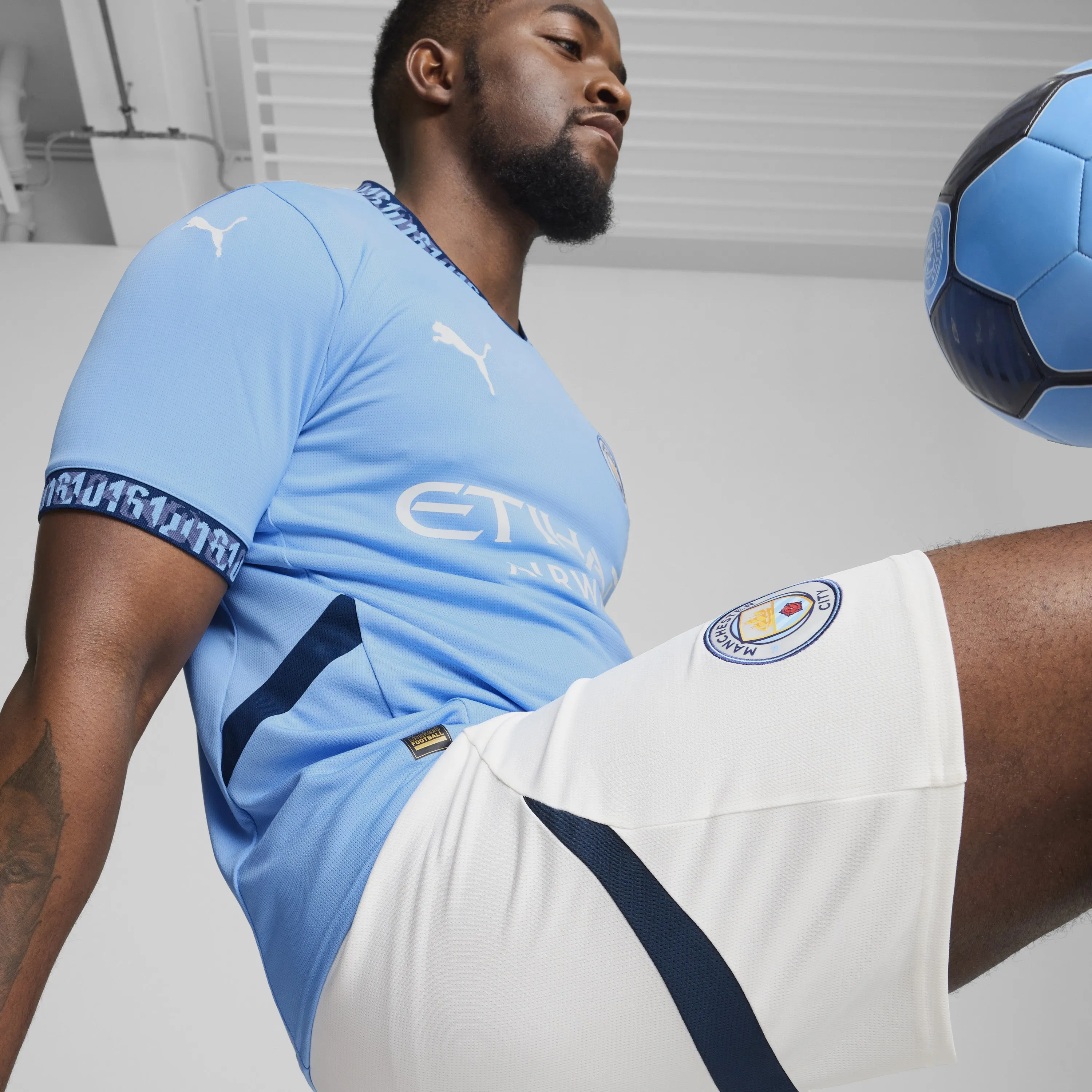 Men's Manchester City 2024/25 Home Replica Soccer Jersey
